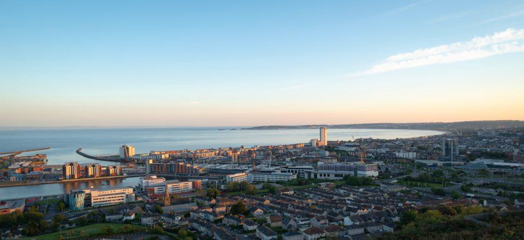 View Of Swansea, Wales, At Sunset