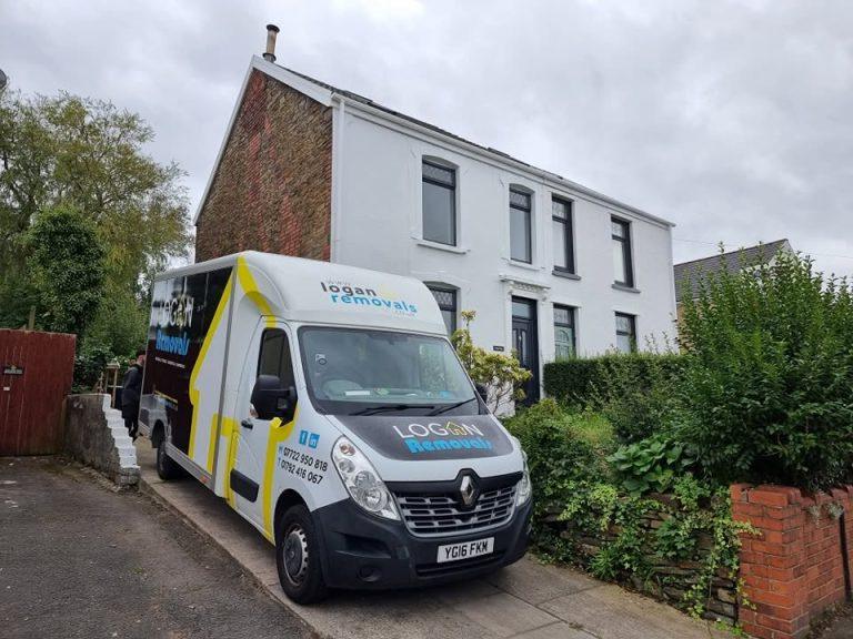 Logan Removals Van Outside House